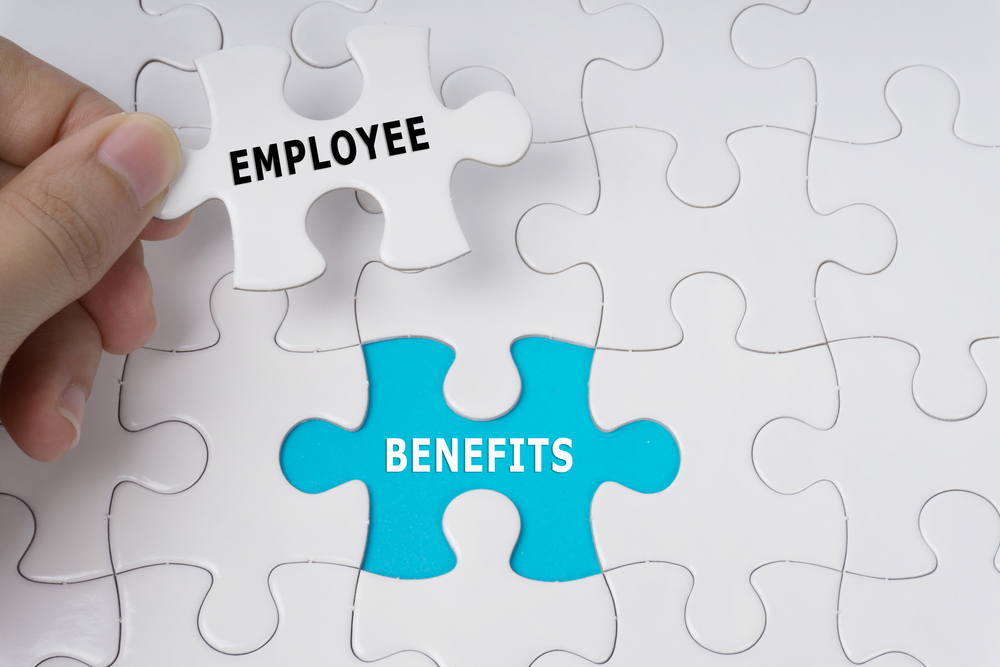 Employee Benefit Concept With Jigsaw Puzzle