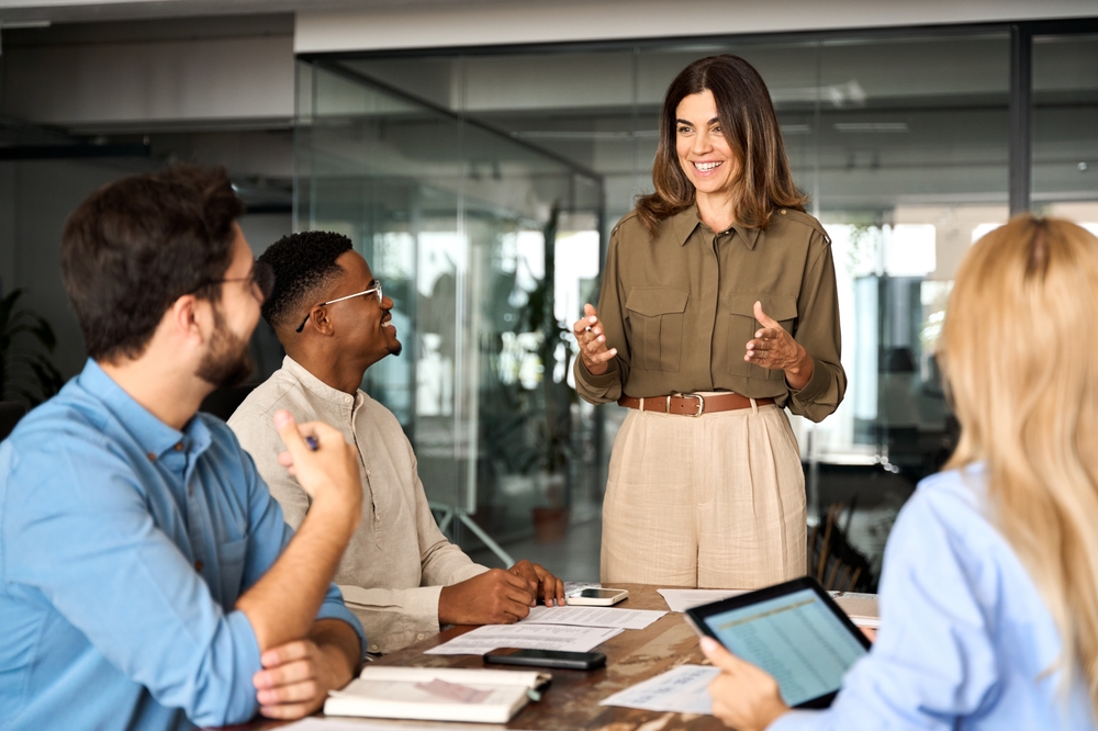 Businesswoman talking to managers